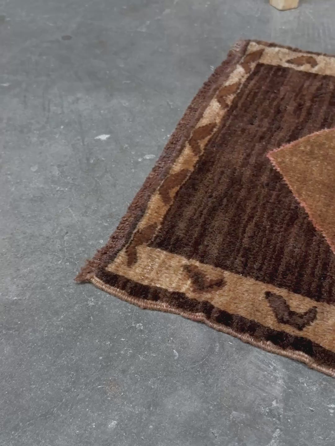 Decorative neutral vintage Turkish mini rug yastik 2x3 made from undyed handspun sheep wool, featuring natural brown and ivory tones with a subtle red accent, geometric medallion design. From Indigo Rugs, Burlingame — the best rug shop in the San Francisco Bay Area. Free shipping.