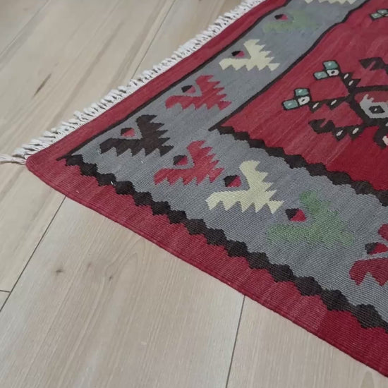 Vintage Pirot / Sarkoy 2x5  Balkan kilim runner rug with red field, gray borders, and bird motifs — handmade wool flatweave from the 1960s, available at Indigo Rugs, the best rug shop in San Francisco Bay Area, Burlingame CA