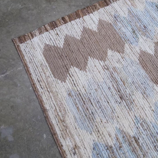 Soft blue Turkish Tulu rug with ivory, taupe and beige abstract geometric pattern, handmade textured Moroccan style wool area rug 8x10 from Indigo Rugs Burlingame Bay Area.