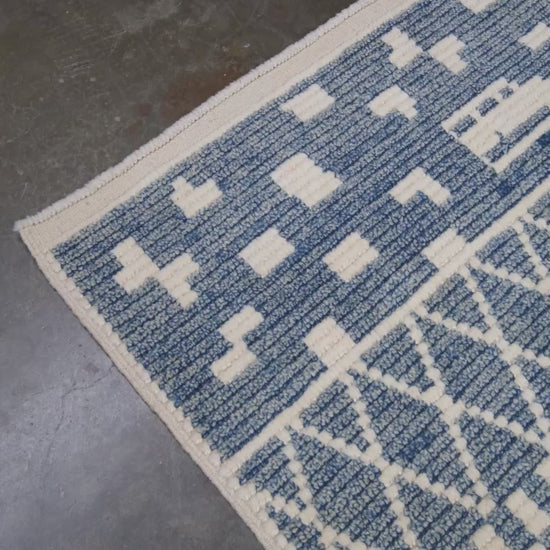 Small blue Turkish Tulu rug with ivory geometric motifs, checker details and textured wool pile, handmade wool rug 4x6 from Indigo Rugs Burlingame Bay Area.