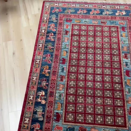 Luxury 6x9 handmade wool rug from Turkey, inspired by ancient Pazyryk motifs, featuring intricate grid patterns and stylized animals, perfect for living rooms, bedrooms, offices, and nurseries. Available at the Beds Rug Shop in the San Francisco Bay Area with free shipping.