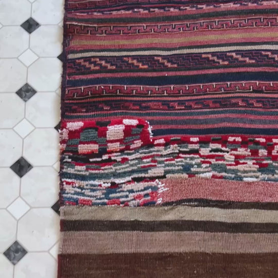 Vintage Bakhtiari saddle bag rug (3'1"x5'9") featuring handspun wool, taupe and indigo stripes, rose and blue tribal accents, and rare triple-weave construction — handmade in NW Persia, circa 1940s