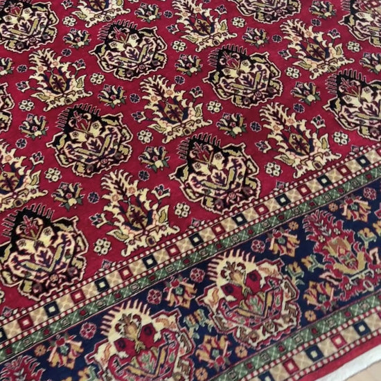 8x10 ft Hereke vintage Turkish luxury rug with crown-like floral motifs, perfect for living rooms, bedrooms, or dining spaces. This elegant handmade wool-on-cotton carpet is in pristine condition with authentic 'HEREKE' marking. From the best luxury handmade rug shop in the San Francisco Bay Area, offering free shipping. Add this timeless piece to your home for unmatched sophistication and style.