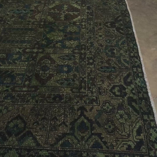 9x12 handmade overdyed Persian Bakhtiari vintage rug in deep moss green with distressed garden panel design — shown at Indigo Rugs, Burlingame — San Francisco Bay Area with free shipping
