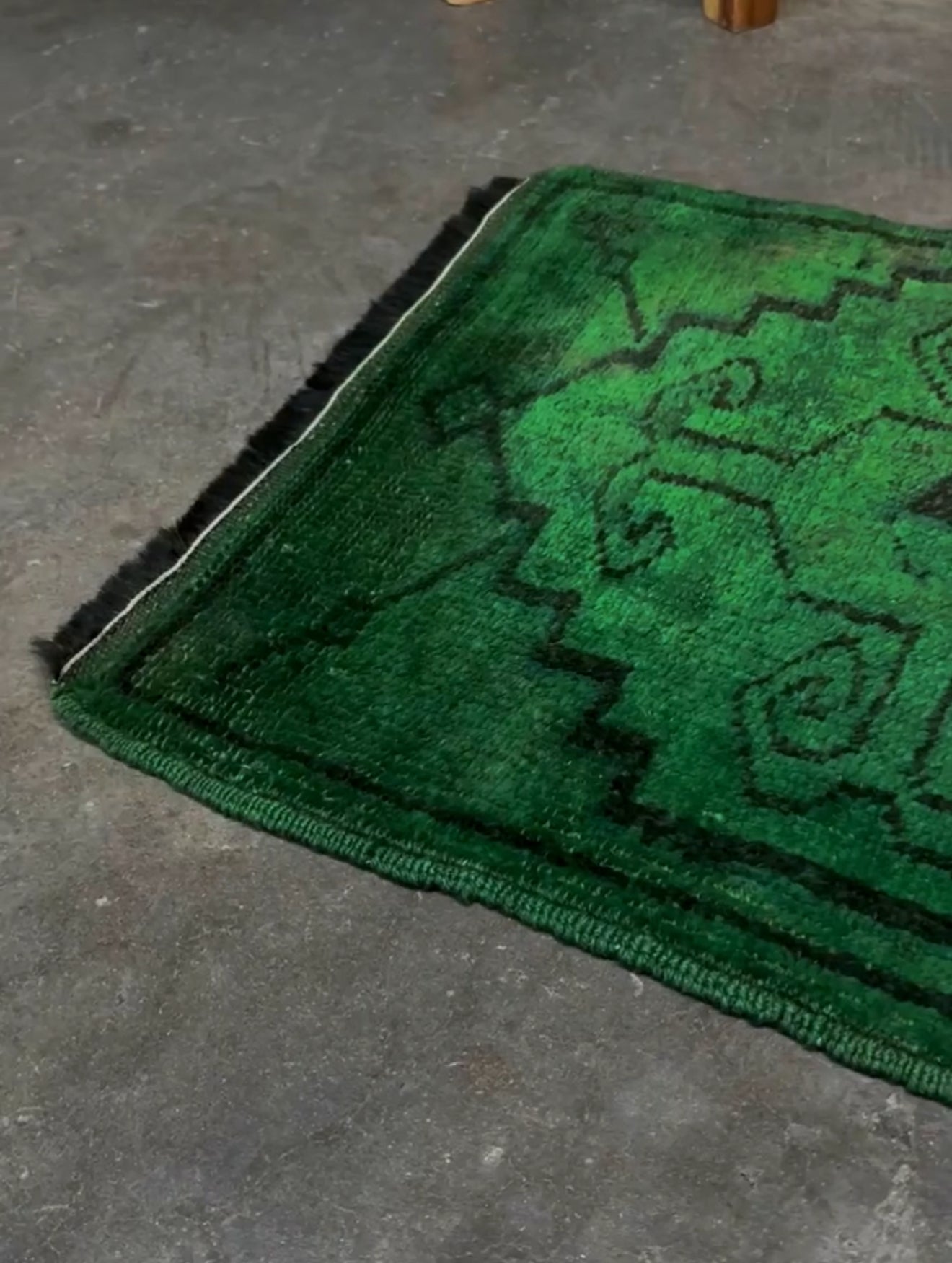 Vintage Turkish Yastik rug in emerald, forest, and moss green with espresso-black tribal outlines. Hand-knotted wool, 20x43 inches. One-of-a-kind rug from Indigo Rugs, the best rug shop in the San Francisco Bay Area (Burlingame, CA). Free shipping included.