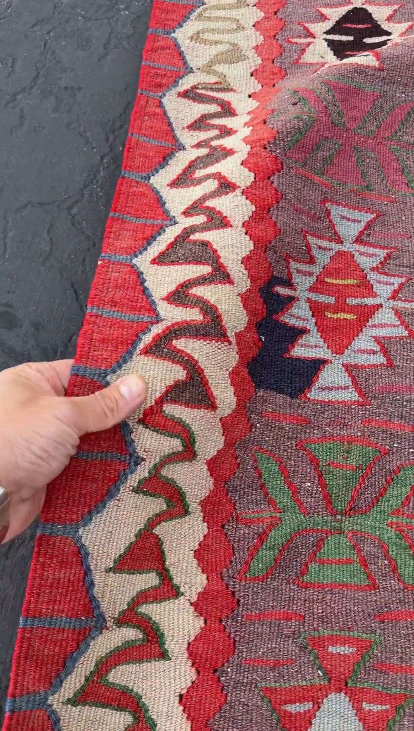 4x10 vintage Turkish Oushak kilim rug with a dusty rose field, geometric tribal medallion, and soft sage, mint, and blue accents — handmade flatweave wool rug from the 1940s, naturally dyed and beautifully aged with mellowed colors and small, well-executed repairs. Perfect for living room or bohemian interior décor — Indigo Rugs.