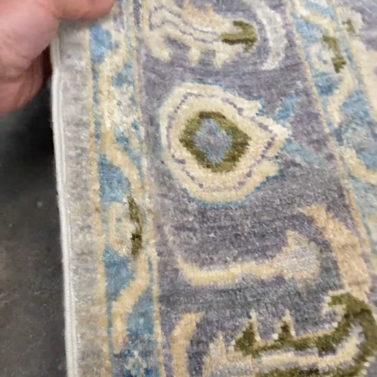 Handmade transitional 6x9 Turkish Oushak rug in silvery gray, powder blue, ivory, olive green, and muted lavender. Perfect for coastal, farmhouse, or light modern interiors — available at Indigo Rugs, Burlingame CA. Free Shipping