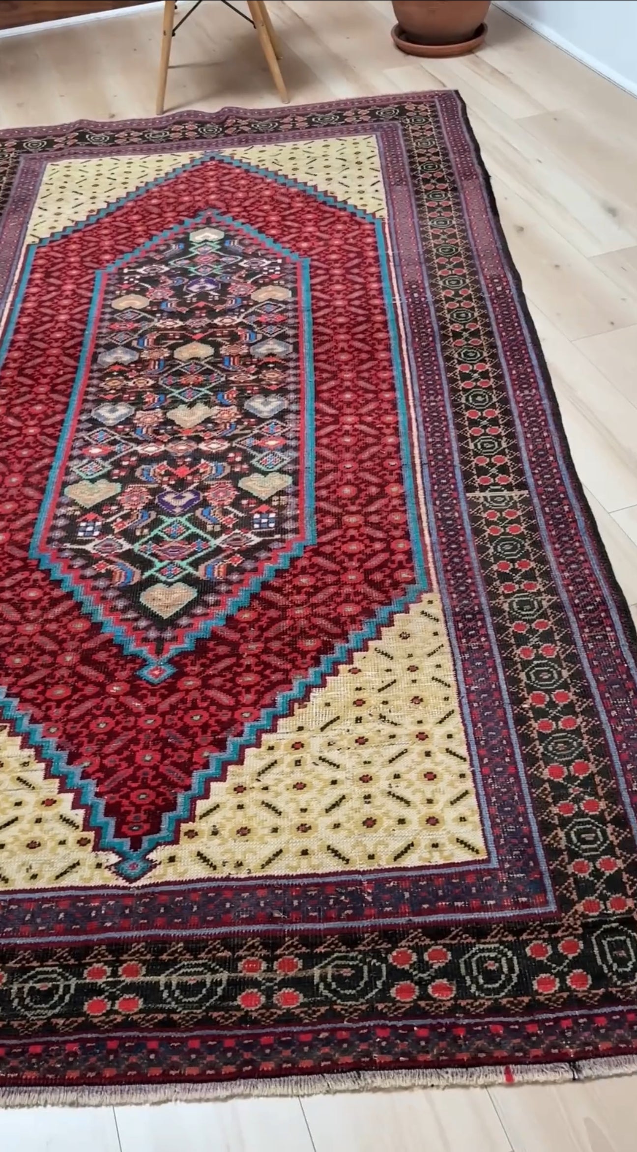 Handmade 5x9 vintage Persian rug with rich crimson, anthracite, and ivory hues, intricate geometric design, and a low pile full of character. Perfect for the bedroom, kitchen, living room, or dining area. Available at the best rug shop in San Mateo, SF Bay Area, with free shipping.
