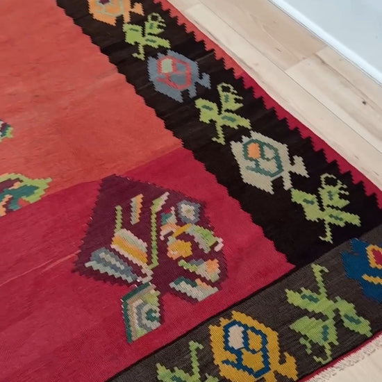 Handmade 8x10 Bessarabian vintage kilim rug with abstract floral design in crimson, green, and pastel hues – perfect for boho or floral decor in living room, bedroom, kitchen, or dining room. Authentic Southeastern European flatweave from the best rug shop in San Mateo, SF Bay Area. Free shipping available.