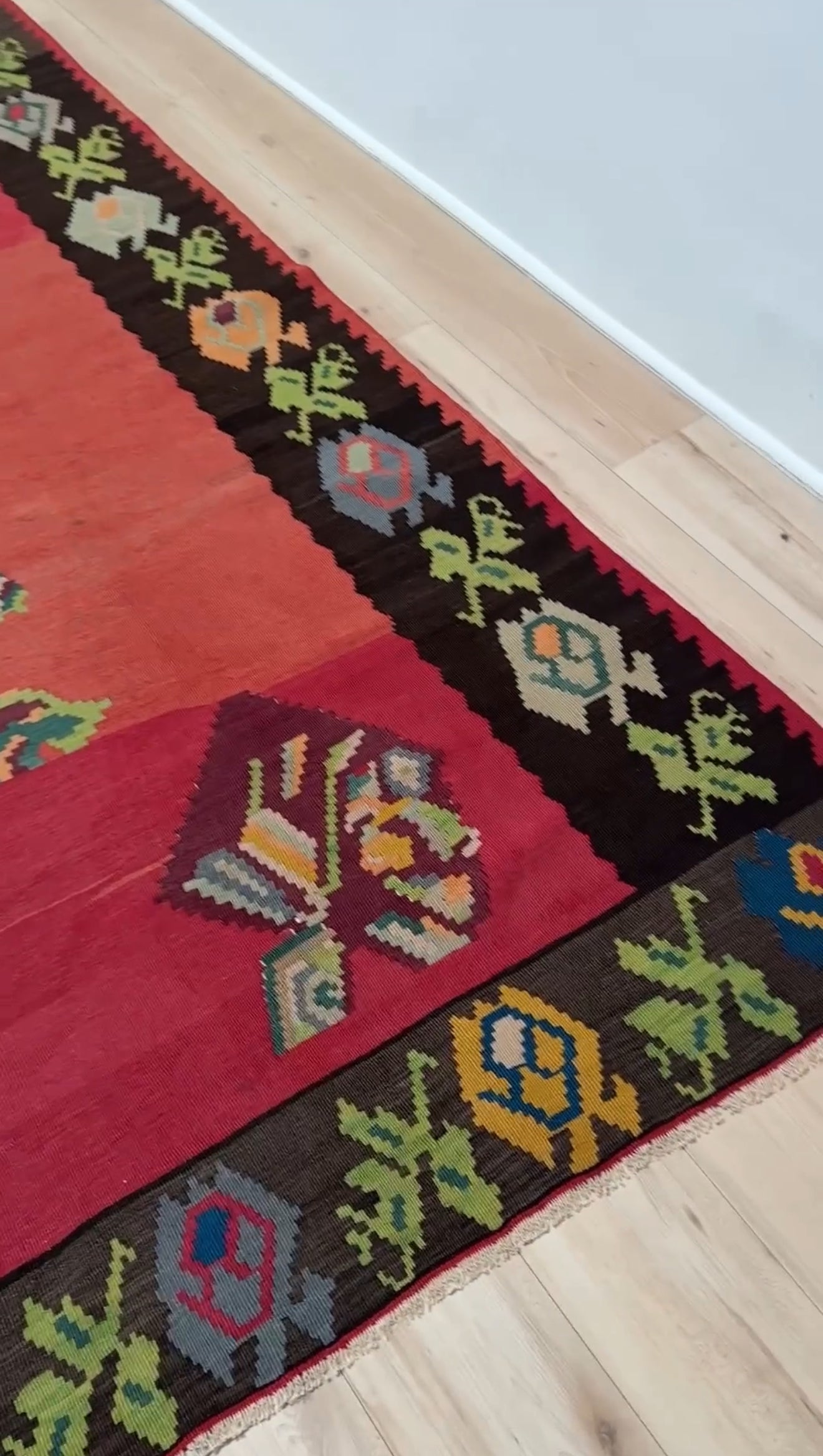 Handmade 8x10 Bessarabian vintage kilim rug with abstract floral design in crimson, green, and pastel hues – perfect for boho or floral decor in living room, bedroom, kitchen, or dining room. Authentic Southeastern European flatweave from the best rug shop in San Mateo, SF Bay Area. Free shipping available.