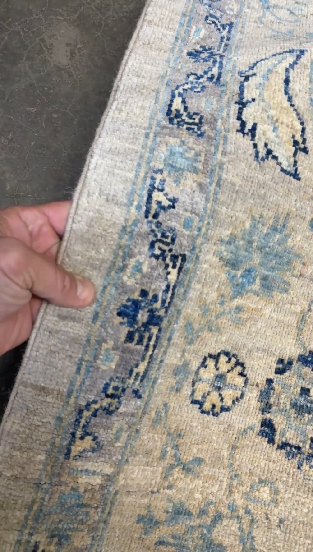 Neutral transitional handmade 8x10 decorative rug with muted gray, ivory, and layered blue tones. Soft Sultanabad-inspired floral motifs, perfect for living rooms, dining spaces, or bedrooms. Contemporary yet timeless, from a rug shop in Burlingame, San Francisco Bay Area, CA with free shipping.
