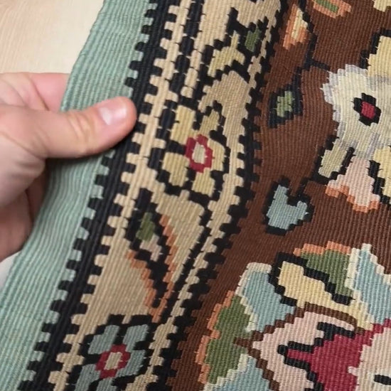 Handmade vintage European kilim rug 8x11 with floral design in robin’s egg blue, chestnut, ivory, and magenta tones; perfect for dining room, living room, bedroom, or kitchen; ideal for boho or floral decor; available at the best rug shop in San Mateo, SF Bay Area with free shipping.