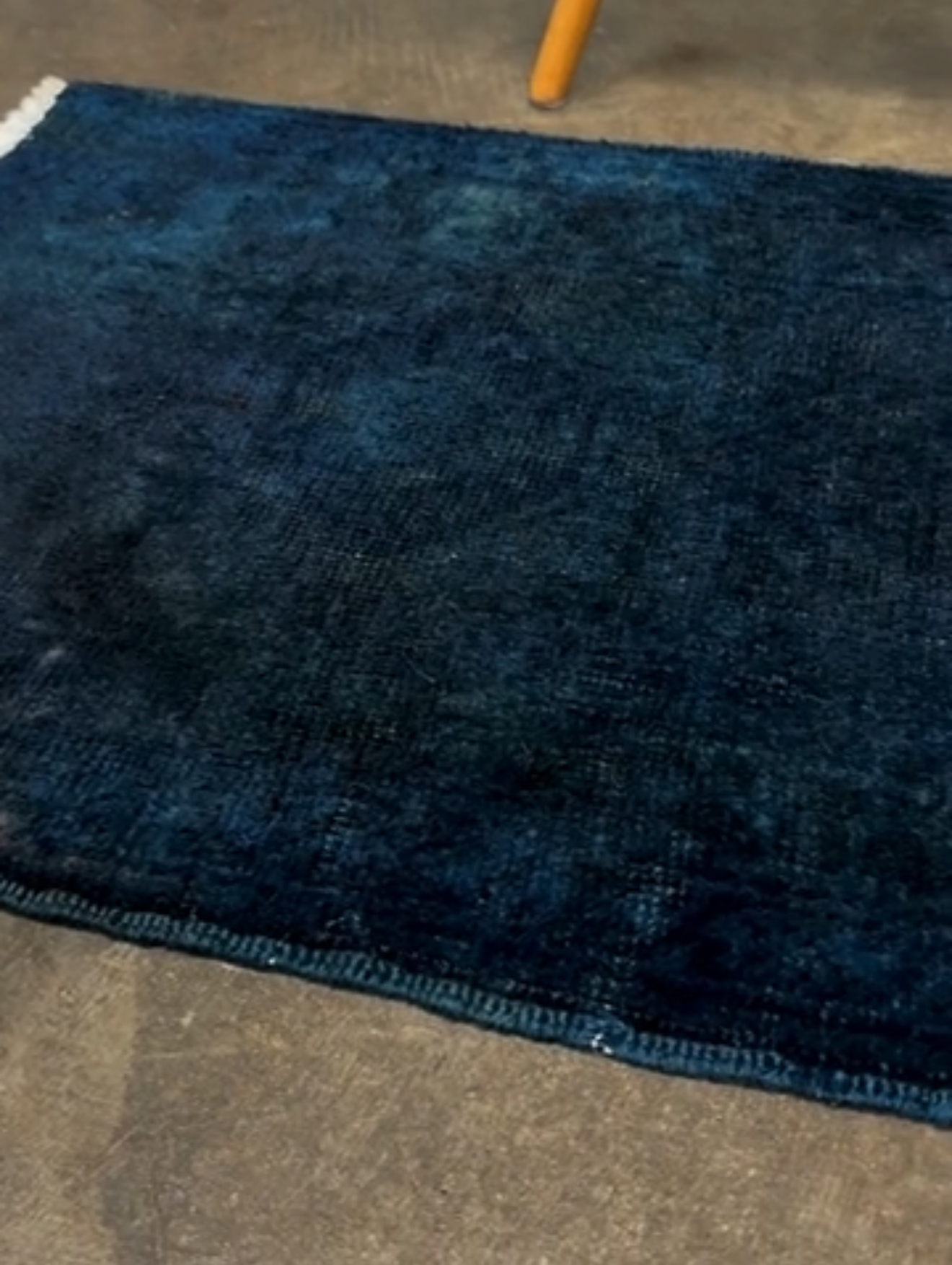 Midnight Blue Turkish overdyed Yastik rug with subtle shadowed motifs. Hand-knotted wool, 20x30 inches. Perfect for: Entryways & apartment foyers, beside the bed, kitchen sink areas, bathroom vanity spots, layered under décor pieces. One-of-a-kind rug from Indigo Rugs in Burlingame, the best rug shop in the San Francisco Bay Area. Free shipping included.