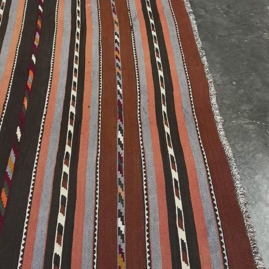 Vintage Caucasian kilim rug with horizontal tribal stripes in rust, brown, gray, and ivory tones, handwoven wool flatweave rug 6x9