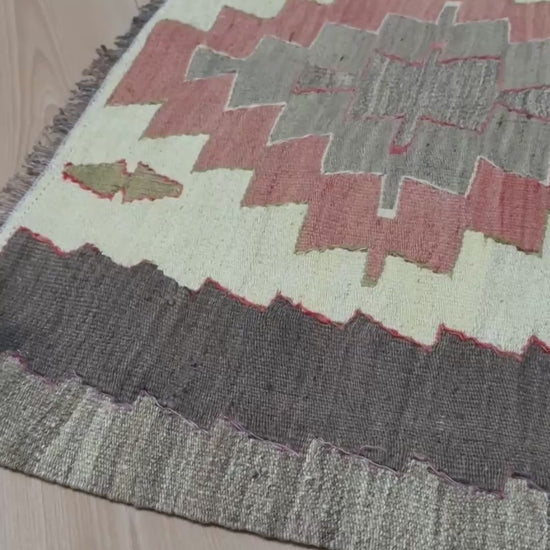 Vintage Mut Turkish kilim  3x5 with pastel tribal medallions in warm ivory, muted rose, dusty sage-green. Handmade Turkish flatweave rug shop rug cleaning  Indigo Rugs in Burlingame / San Francisco Bay Area.