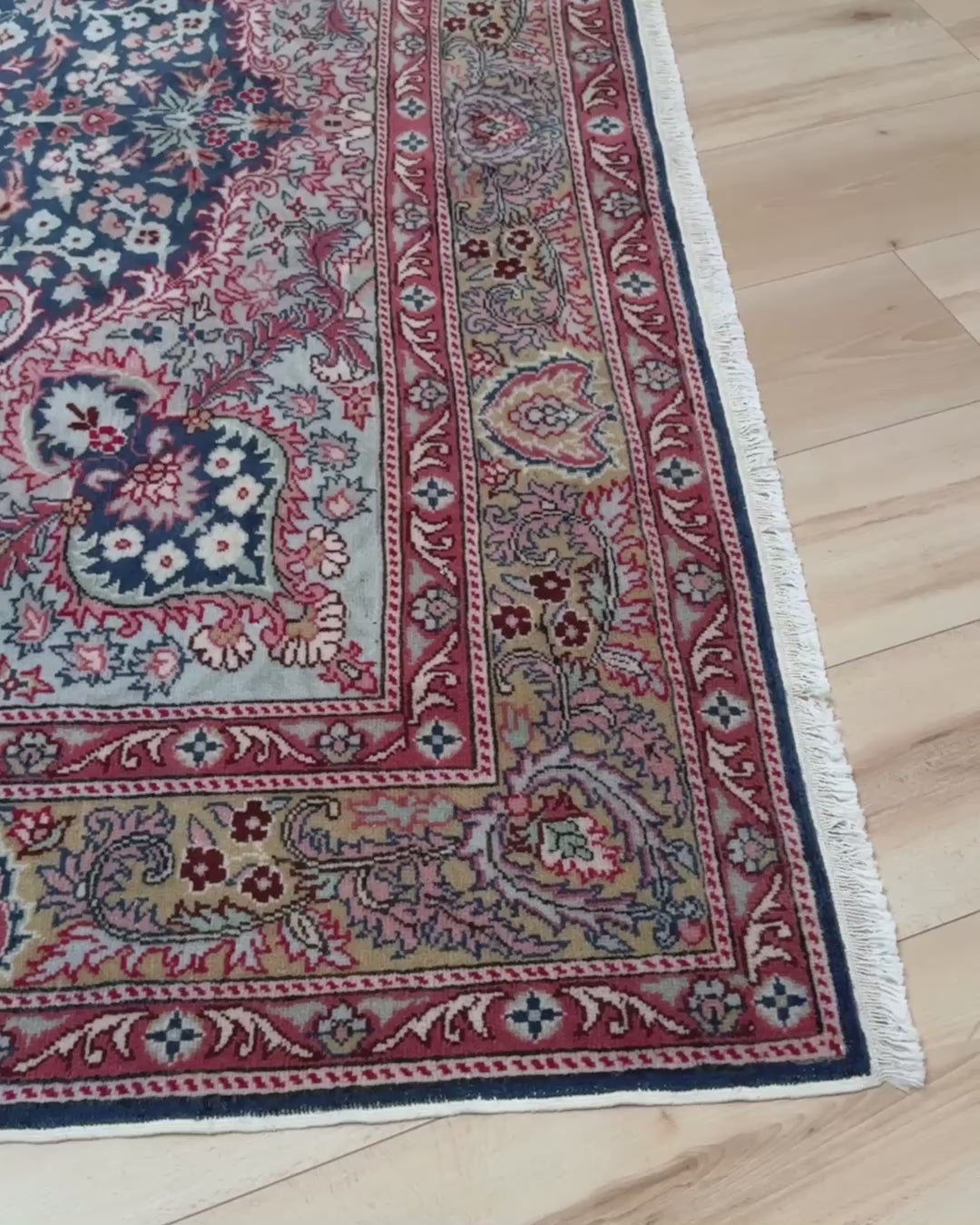 Blue vintage Turkish rug with deep blue field,  floral medallion, handmade wool 7x9 from Indigo Rugs Burlingame Bay Area.