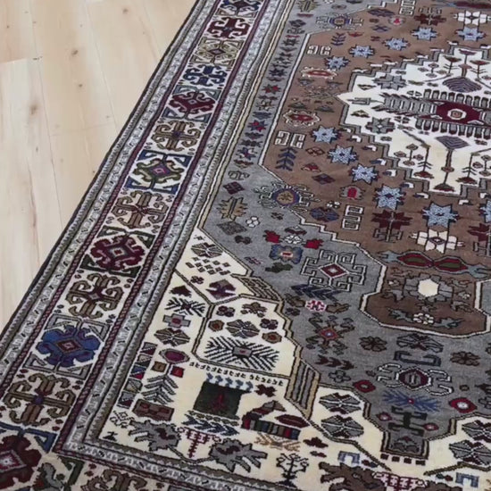 Neutral Konya Turkish handmade rug with chestnut brown and gray field, tribal medallion design, and geometric borders, 6x9 area rug