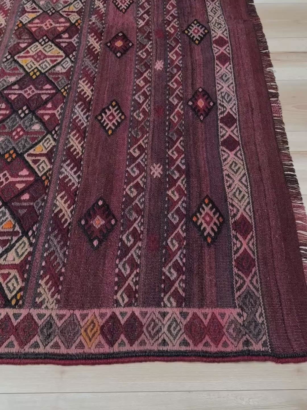 7x13 eggplant purple oxblood red Vintage 1940s Kurdish Kars kilim rug with tribal motifs. Handmade wool flatweave rug — perfect for long living rooms, hallways, great rooms, and layered interiors. From Indigo Rugs, Burlingame CA. Free shipping.