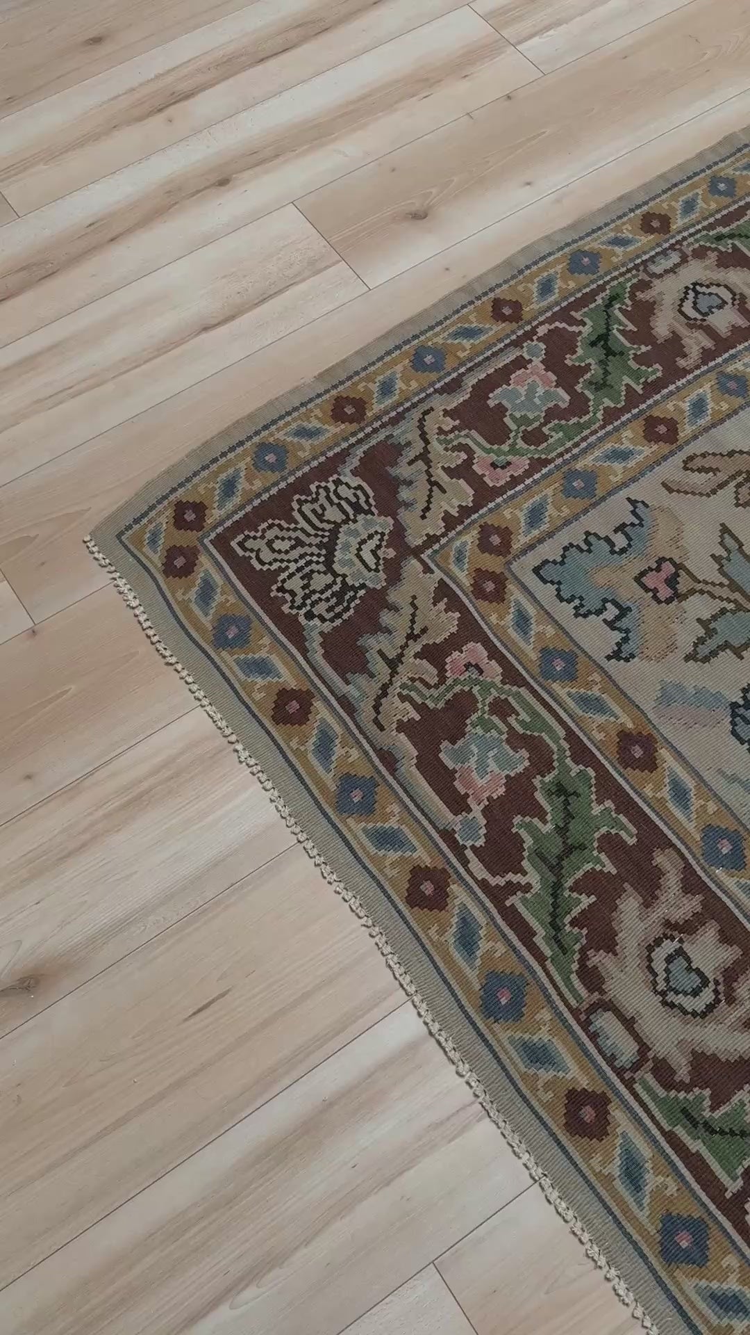 Handmade square 8x9 vintage Balkan floral kilim flatweave rug with light parchment field and vine-and-blossom design in dusty blue, rose, and sage tones.