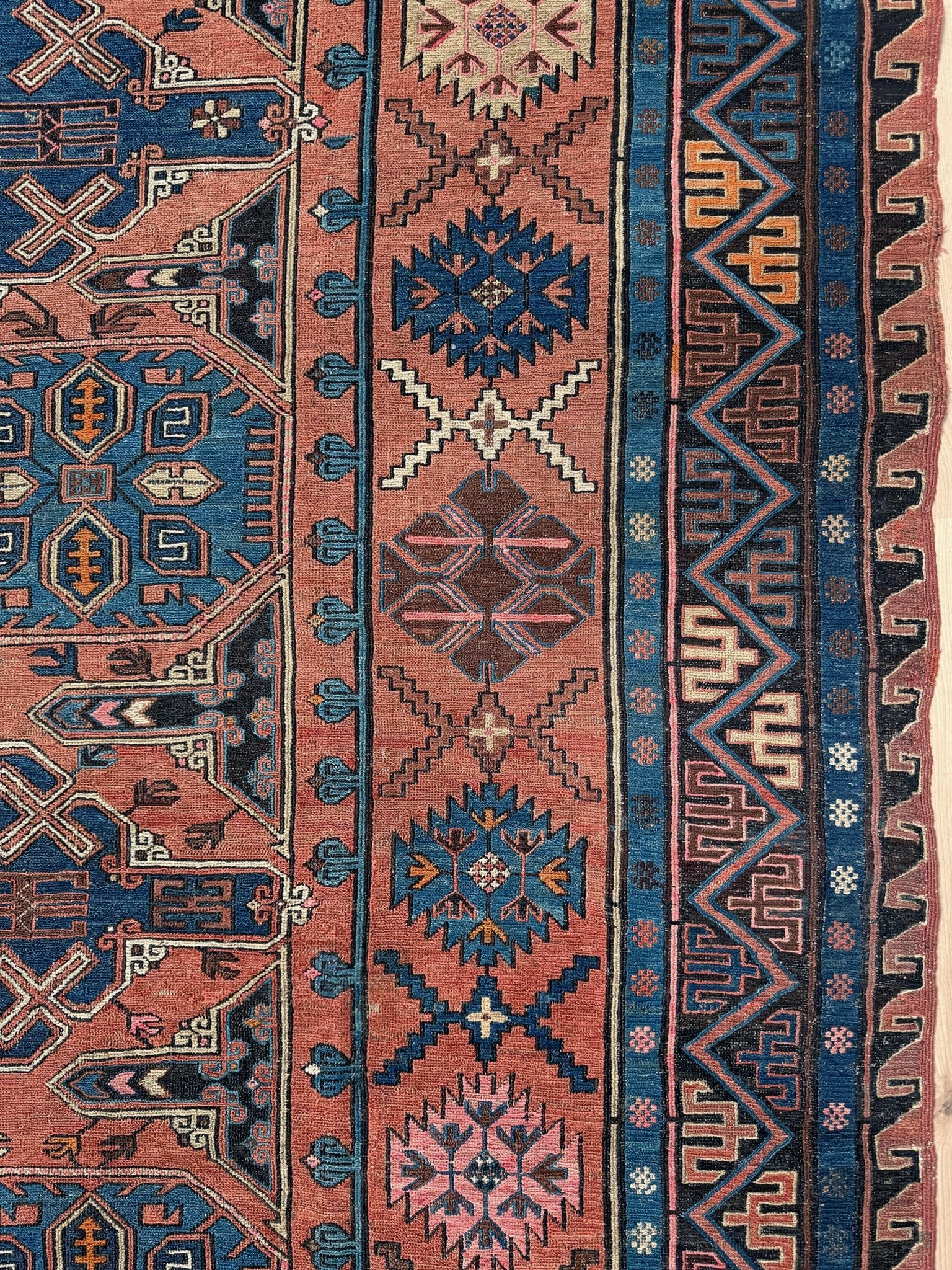 Late 19th century antique Konagkend Soumak rug from Kuba, Caucasus – 7x10 tribal flatweave with indigo, terracotta, and copper brown tones, available at the best rug shop in San Mateo, SF Bay Area with free shipping.
