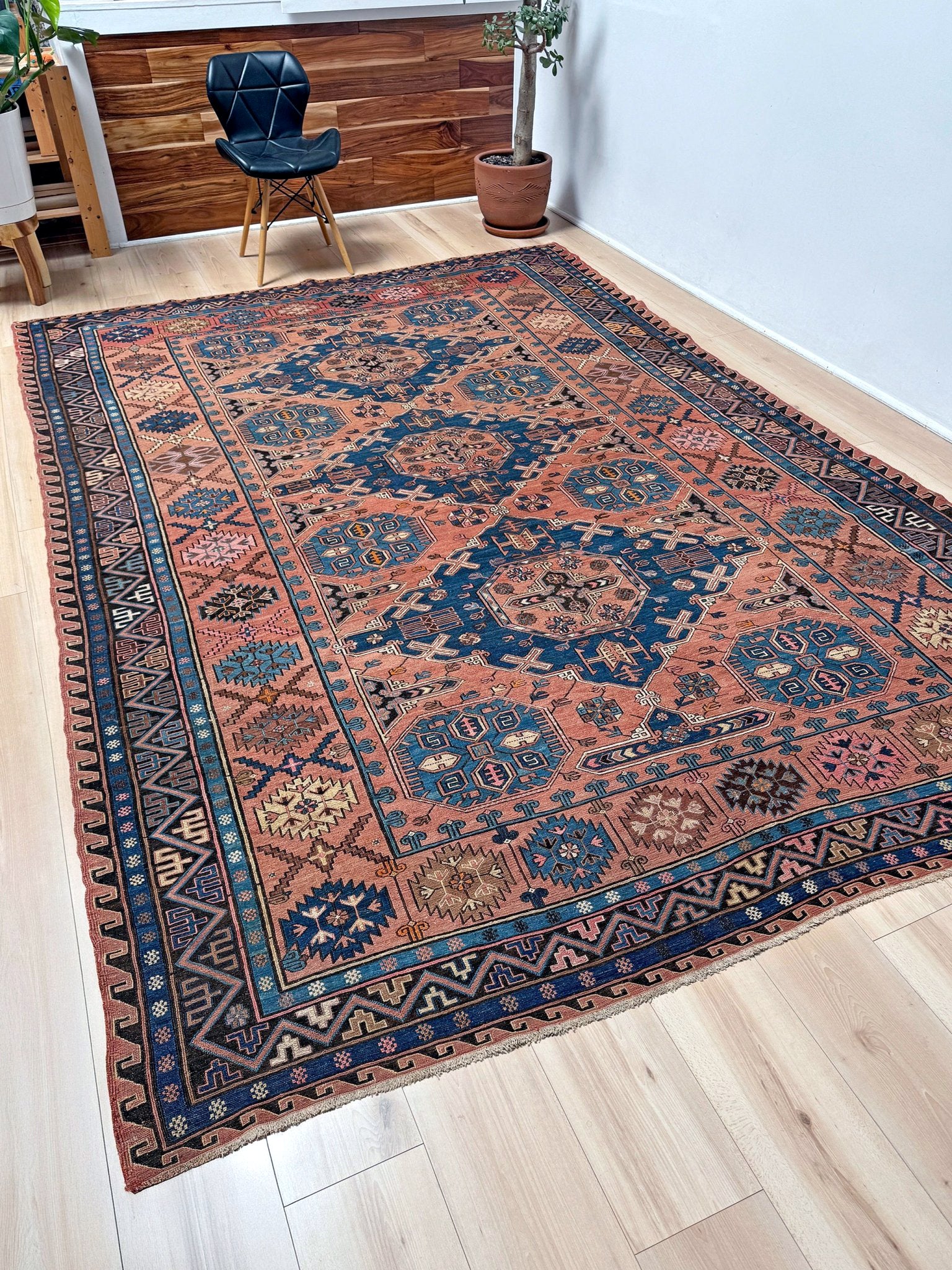 Late 19th century antique Konagkend Soumak rug from Kuba, Caucasus – 8x10 tribal flatweave with indigo, terracotta, and copper brown tones, available at the best rug shop in San Mateo, SF Bay Area with free shipping.
