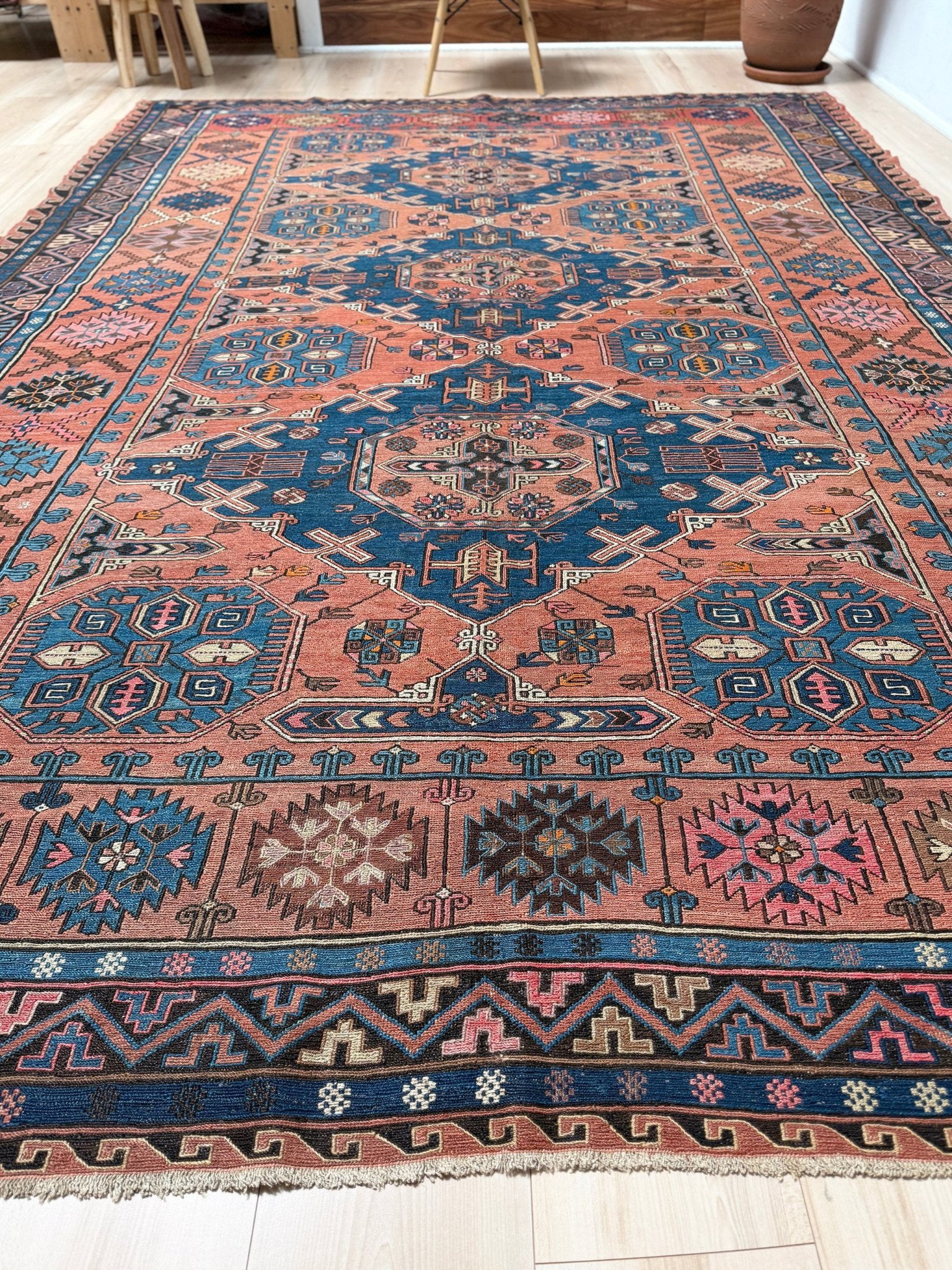 Late 19th century antique Konagkend Soumak rug from Kuba, Caucasus – 8x10 tribal flatweave with indigo, terracotta, and copper brown tones, available at the best rug shop in San Mateo, SF Bay Area with free shipping.