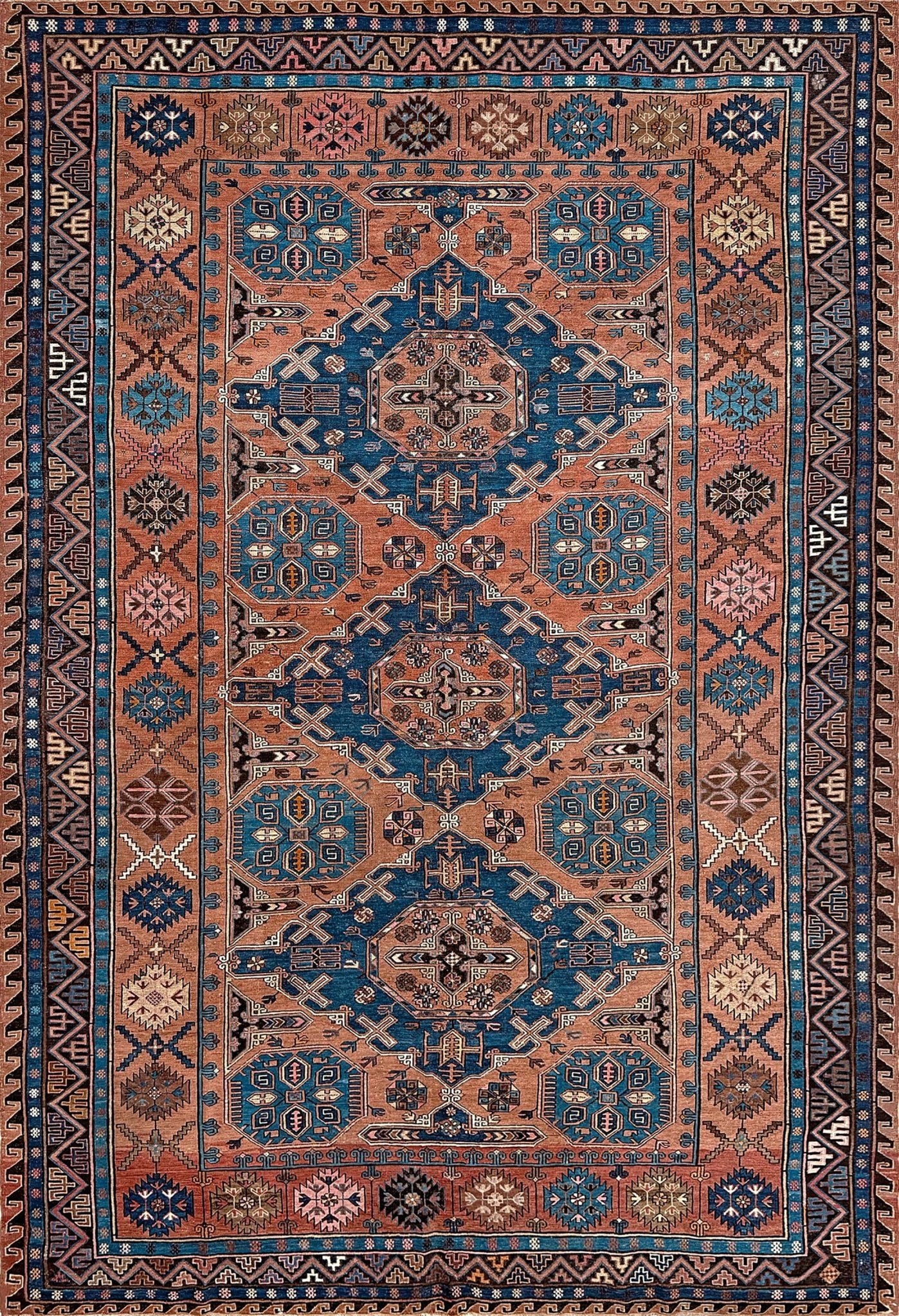 Late 19th century antique Konagkend Soumak rug from Kuba, Caucasus – 8x10 tribal flatweave with indigo, terracotta, and copper brown tones, available at the best rug shop in San Mateo, SF Bay Area with free shipping.