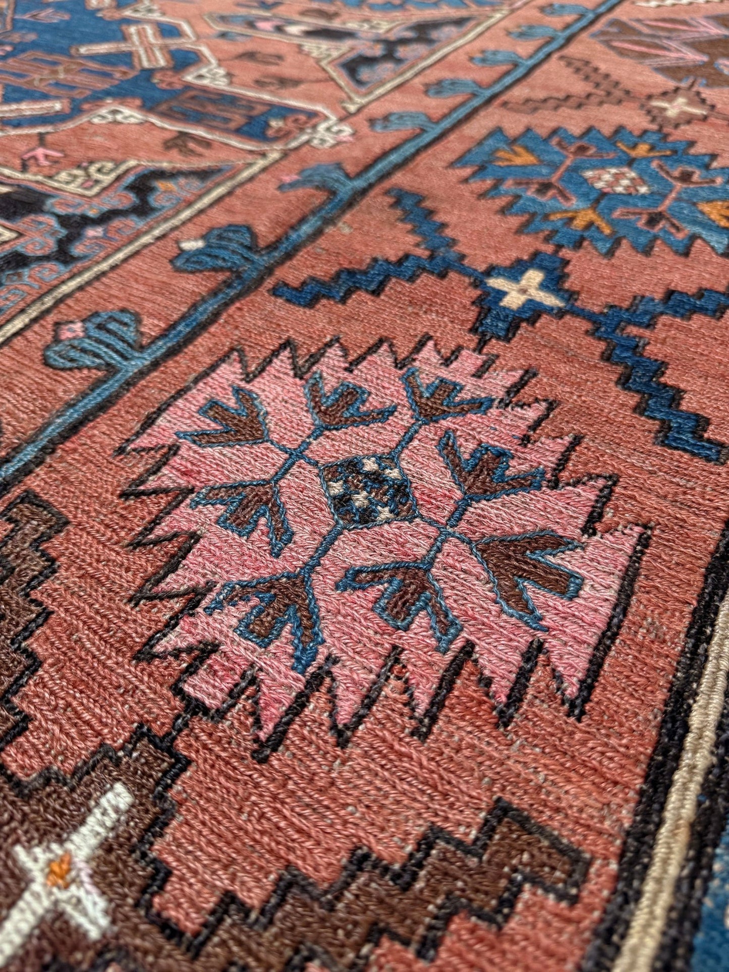 Late 19th century antique Konagkend Soumak rug from Kuba, Caucasus – 7x10 tribal flatweave with indigo, terracotta, and copper brown tones, available at the best rug shop in San Mateo, SF Bay Area with free shipping.