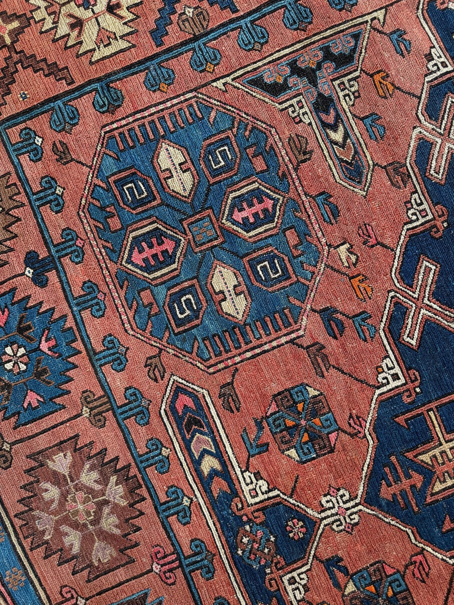 Late 19th century antique Konagkend Soumak rug from Kuba, Caucasus – 7x10 tribal flatweave with indigo, terracotta, and copper brown tones, available at the best rug shop in San Mateo, SF Bay Area with free shipping.