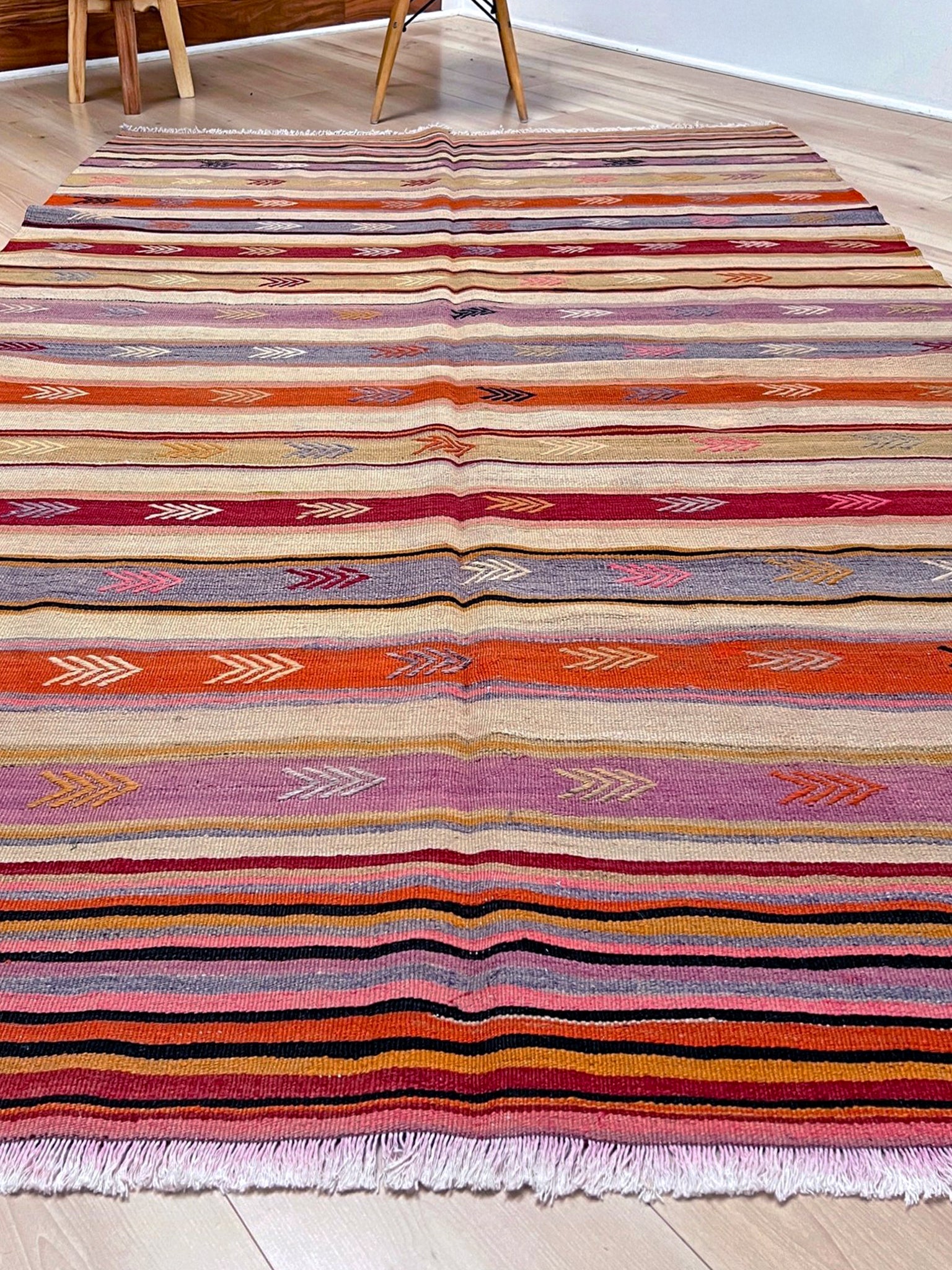 Vintage turkish kilim rug shop bay area. Handmade vibrant rug in living room setting. 6x8 handmade wool rug.  Kilim shop san francisco bay area berkeley california.