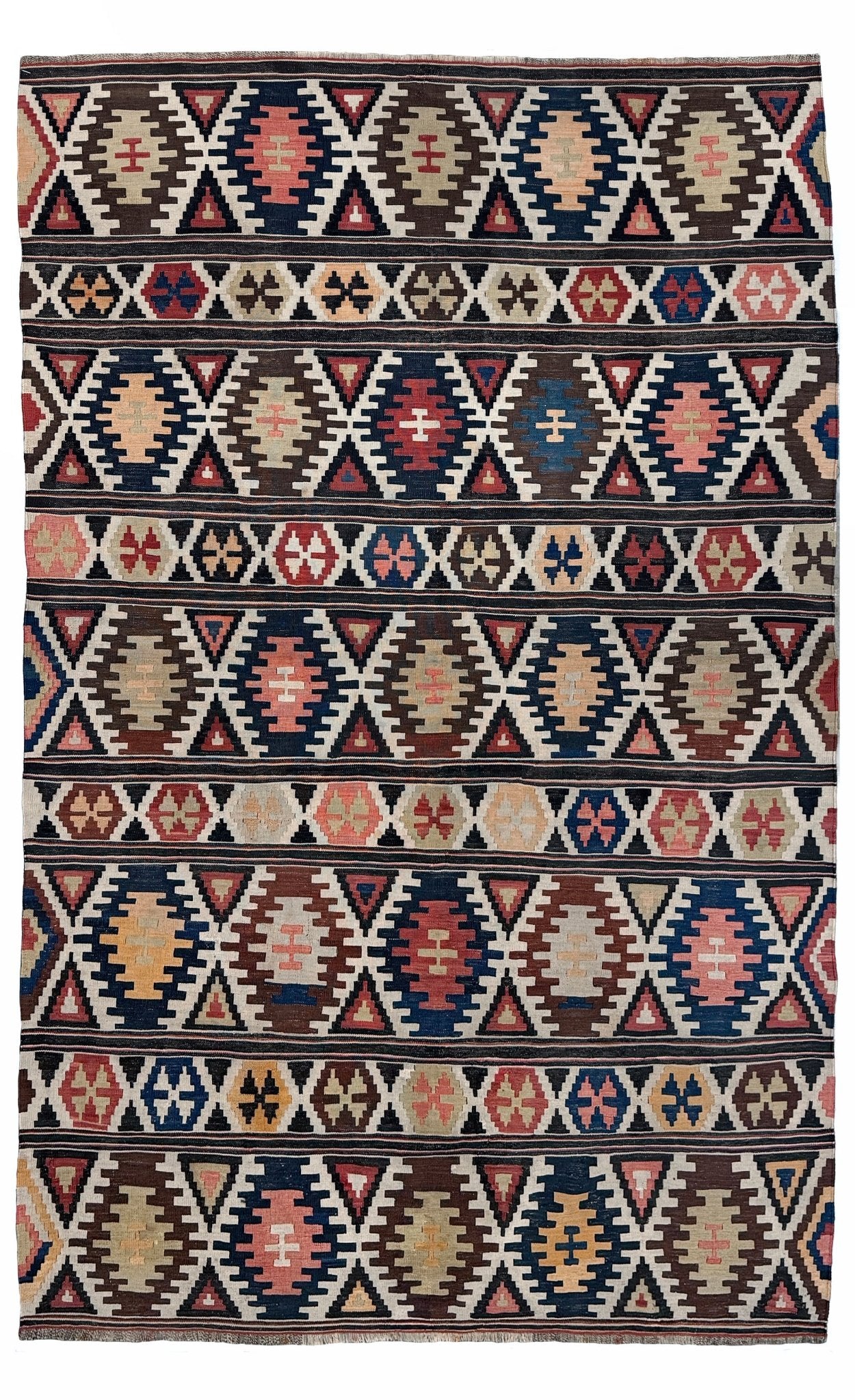 Traditional patterned rug with geometric design. Vintage Caucasian Kazak tribal kilim rug with geometric medallions in beige, red, blue, and brown — handmade flatweave 5x8