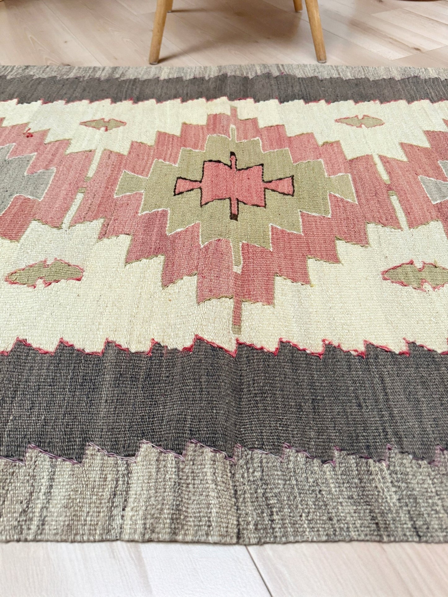 Vintage Mut Turkish kilim  3x5 with pastel tribal medallions in warm ivory, muted rose, dusty sage-green. Handmade Turkish flatweave rug shop rug cleaning  Indigo Rugs in Burlingame / San Francisco Bay Area.