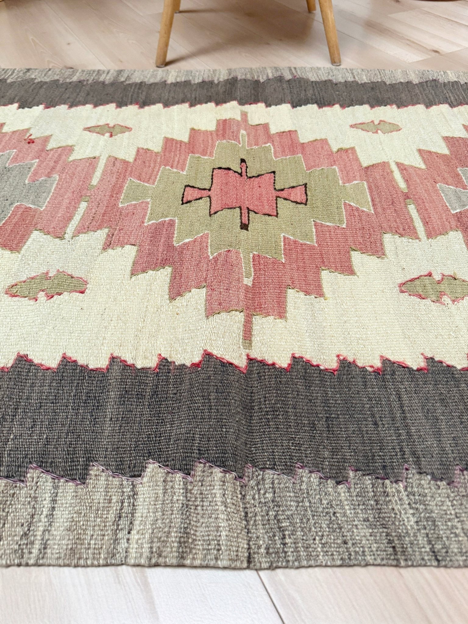 Vintage Mut Turkish kilim  3x5 with pastel tribal medallions in warm ivory, muted rose, dusty sage-green. Handmade Turkish flatweave rug shop rug cleaning  Indigo Rugs in Burlingame / San Francisco Bay Area.