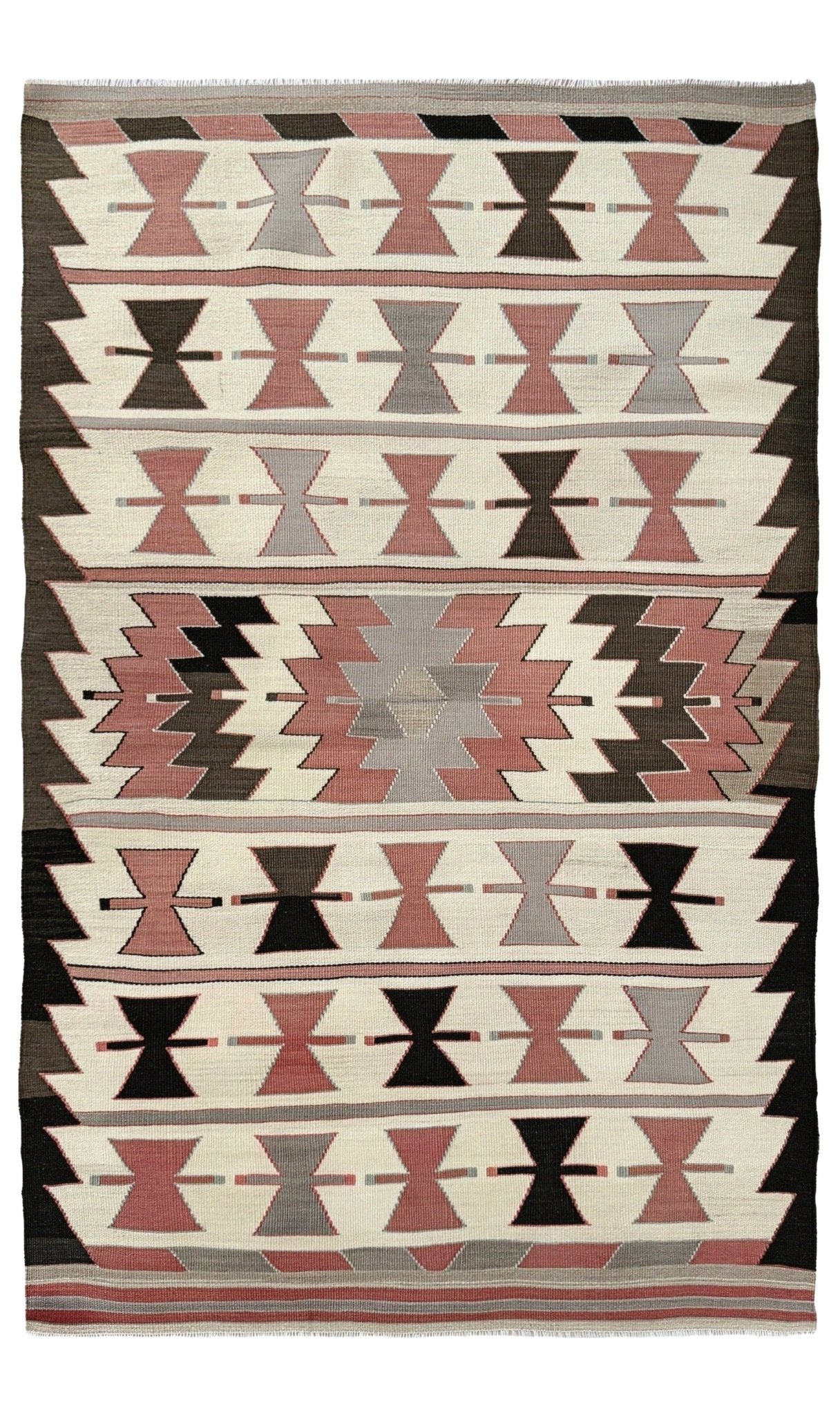 Woven textile with geometric pattern featuring black, pink, and gray on a white background. Vintage Mut Turkish kilim 3x5 with bow-tie tribal motifs and a stepped medallion Handmade Turkish flatweave, 1970s, sold by Indigo Rugs in Burlingame / San Francisco Bay Area.