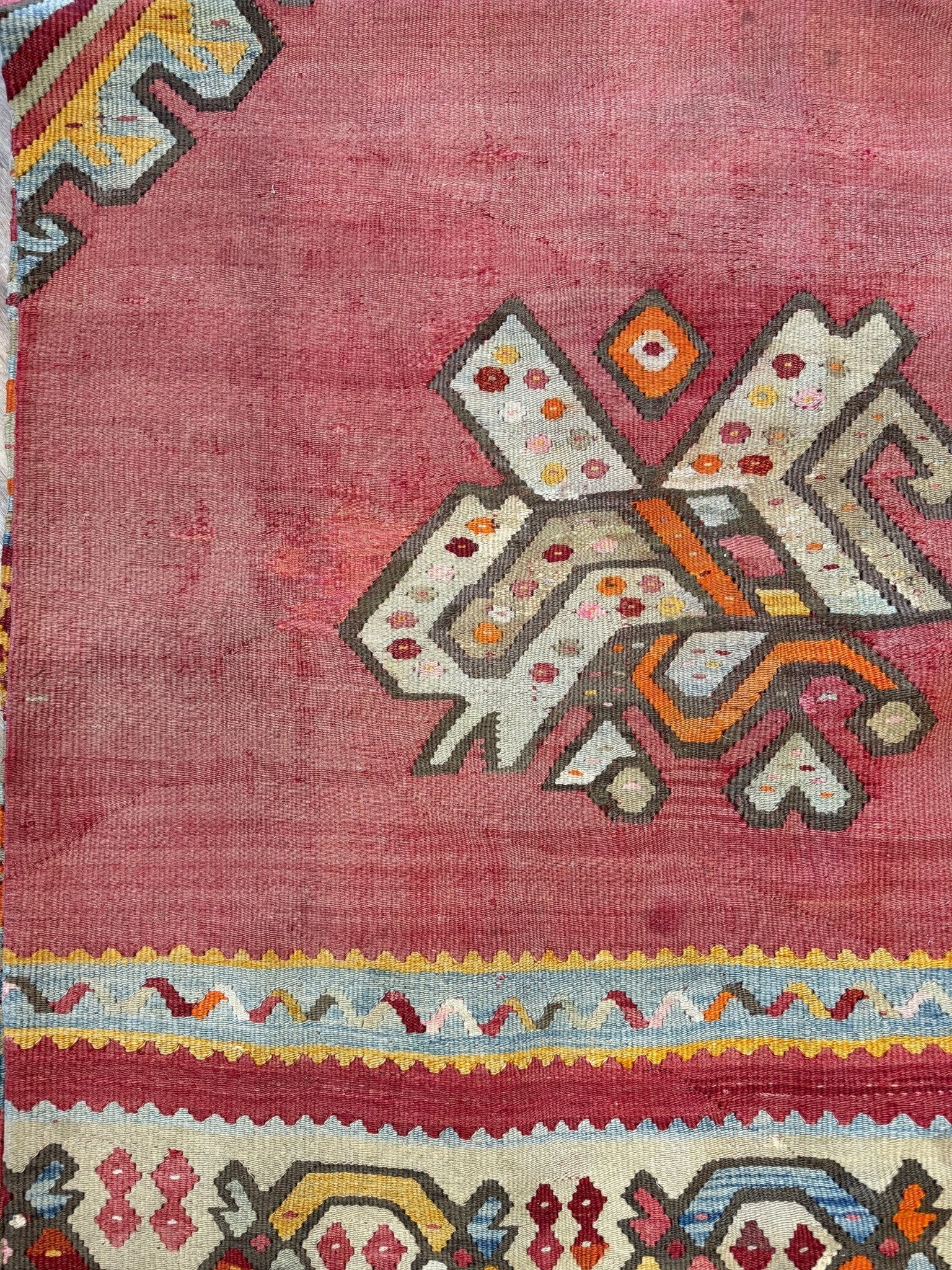 Muted brick red 1920s handmade Oushak Turkish kilim rug with red field and Elibelinde motif, perfect for boho or floral decor styles in living room, bedroom, kitchen, or dining room; available from top-rated rug shop in San Mateo, SF Bay Area with free shipping.