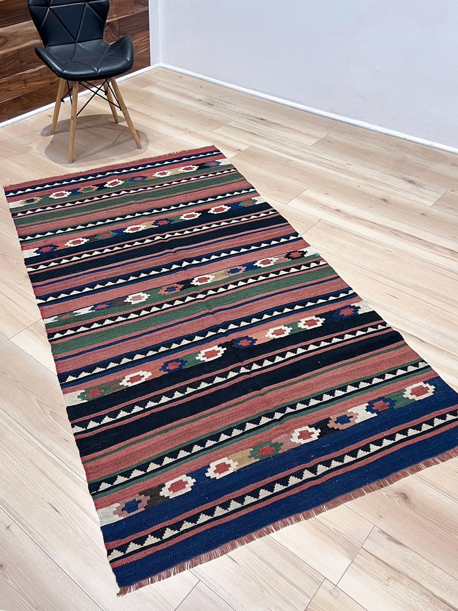 Vintage Caucasian Kilim flatweave rug with rose, green, and navy horizontal stripes and tribal motifs — handmade wool wall hanging from the 1960s, available at Indigo Rugs, the best rug shop in San Francisco Bay Area, Burlingame CA.