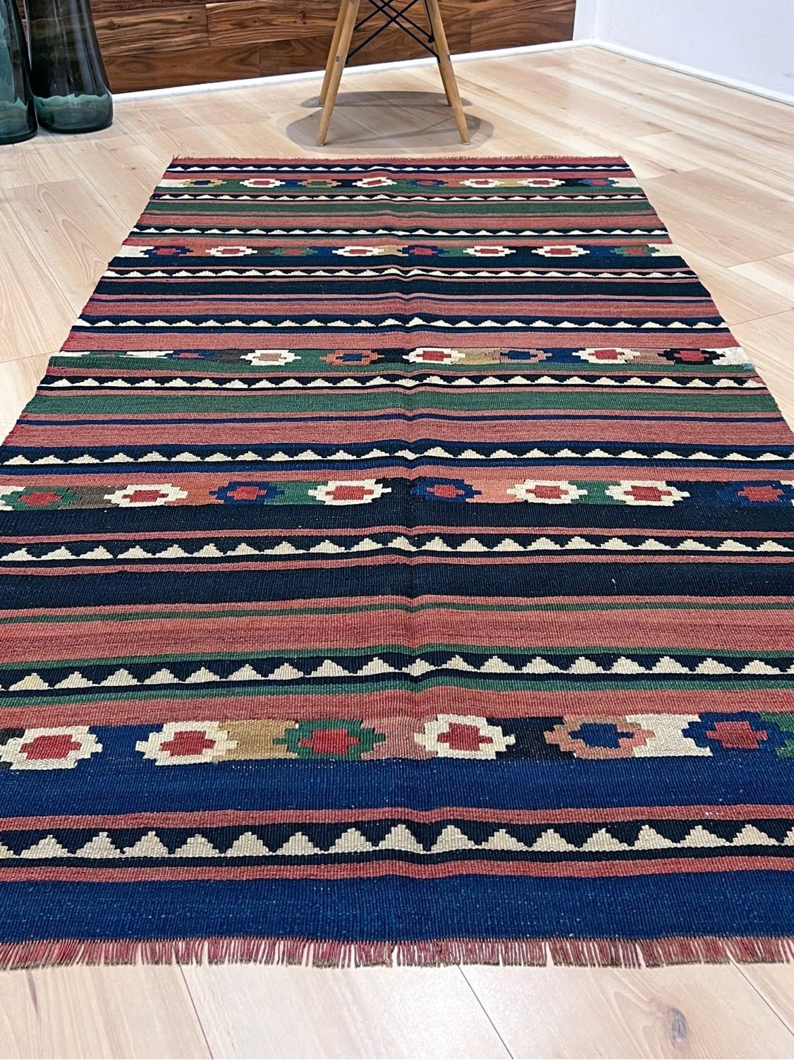 Vintage Caucasian Kilim flatweave rug with rose, green, and navy horizontal stripes and tribal motifs — handmade wool wall hanging from the 1960s, available at Indigo Rugs, the best rug shop in San Francisco Bay Area, Burlingame CA.