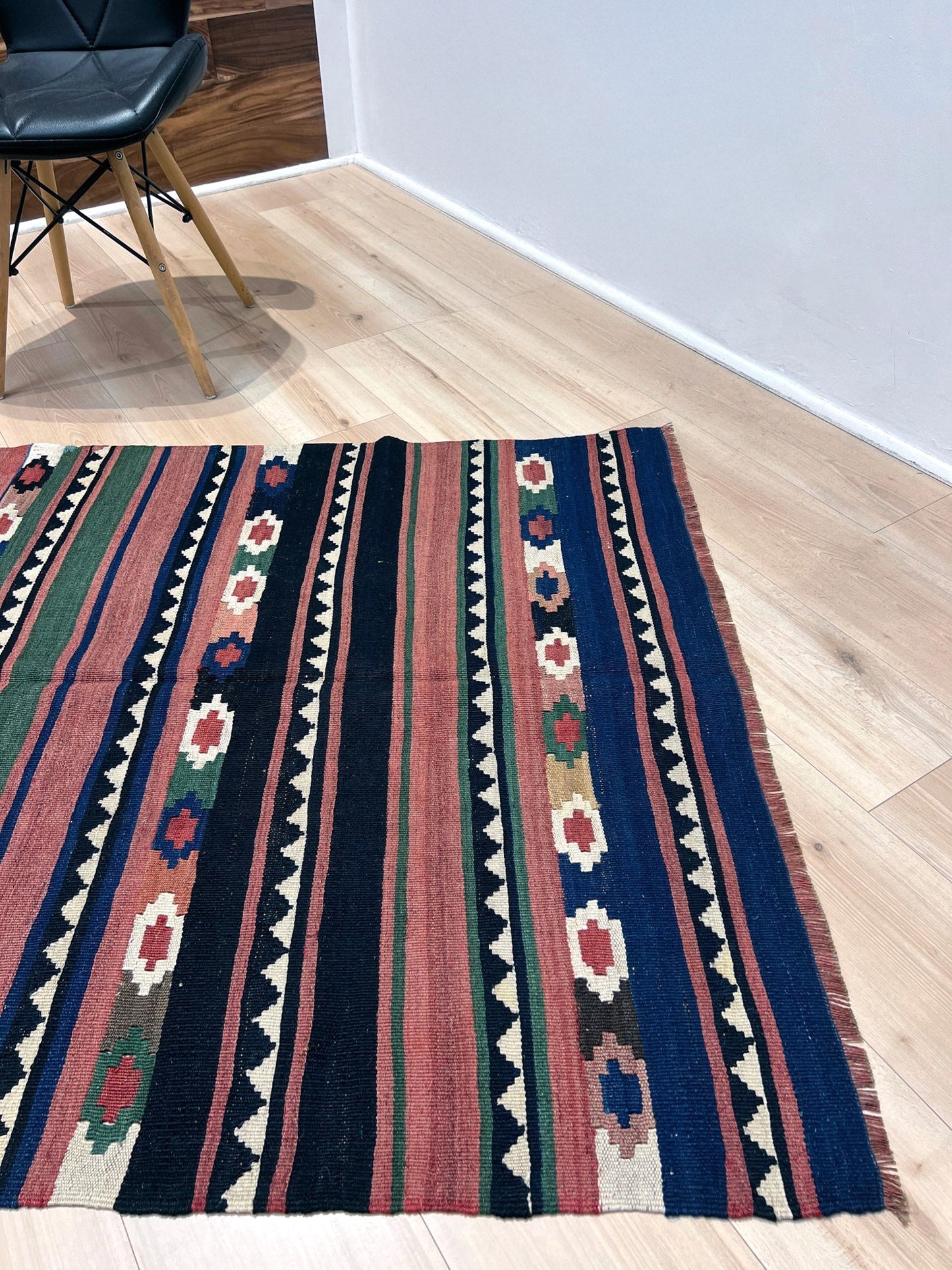Vintage Caucasian Kilim flatweave rug with rose, green, and navy horizontal stripes and tribal motifs — handmade wool wall hanging from the 1960s, available at Indigo Rugs, the best rug shop in San Francisco Bay Area, Burlingame CA.