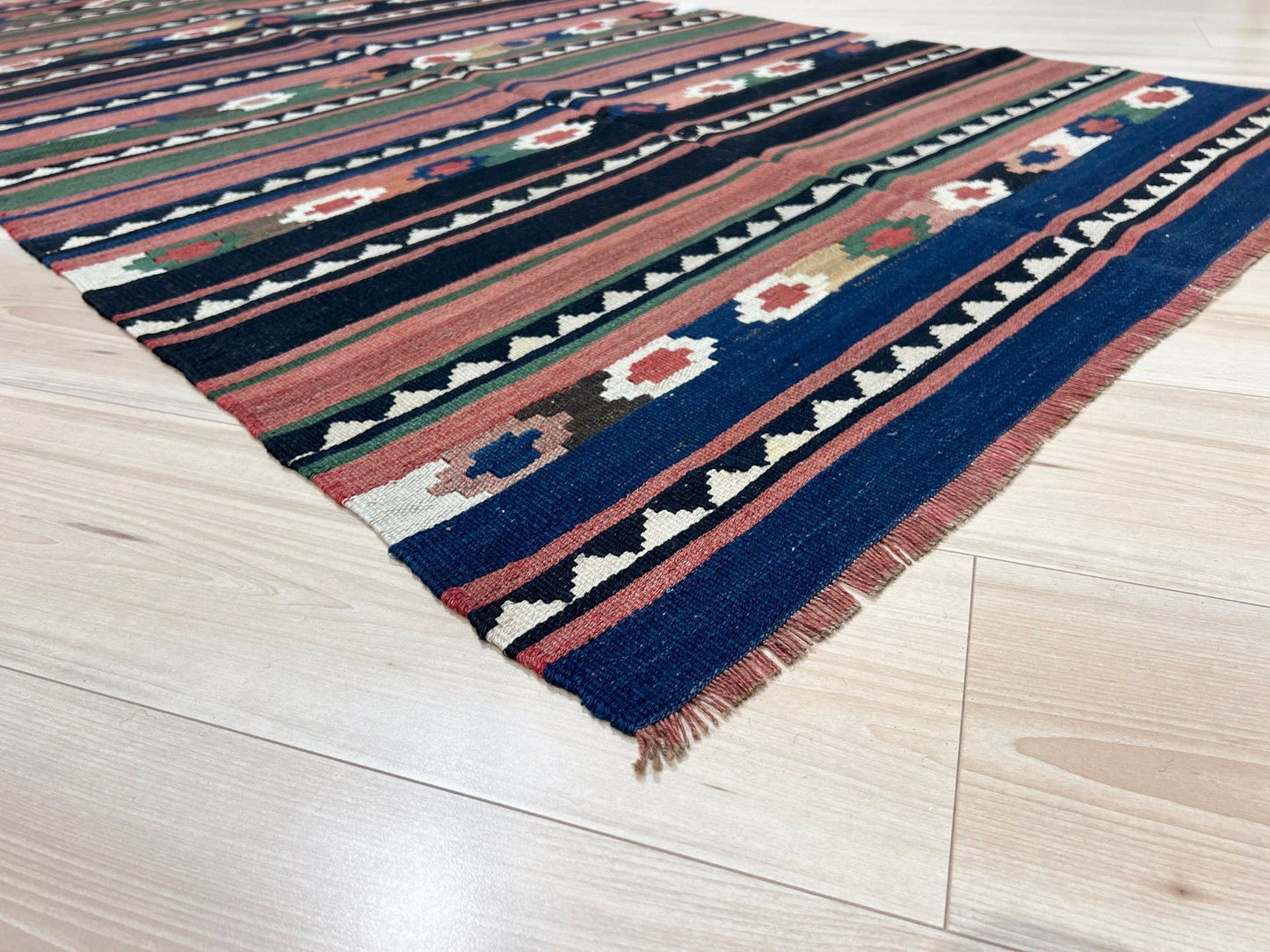 Vintage Caucasian Kilim flatweave rug with rose, green, and navy horizontal stripes and tribal motifs — handmade wool wall hanging from the 1960s, available at Indigo Rugs, the best rug shop in San Francisco Bay Area, Burlingame CA.