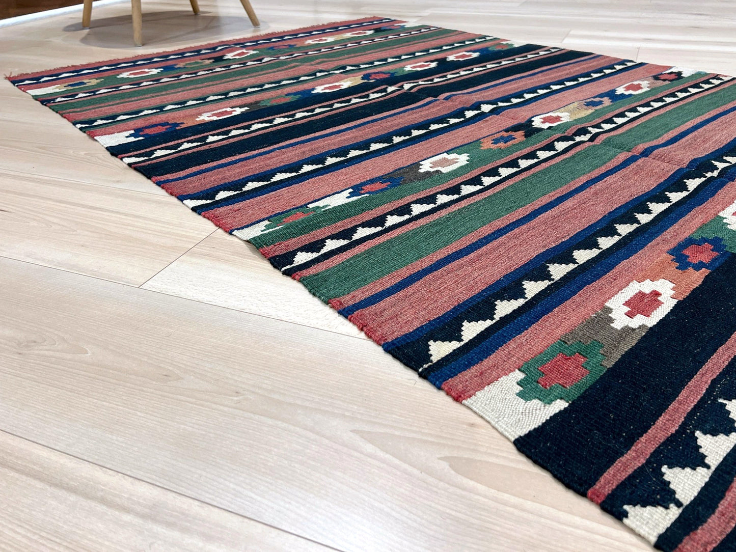 Vintage Caucasian Kilim flatweave rug with rose, green, and navy horizontal stripes and tribal motifs — handmade wool wall hanging from the 1960s, available at Indigo Rugs, the best rug shop in San Francisco Bay Area, Burlingame CA.