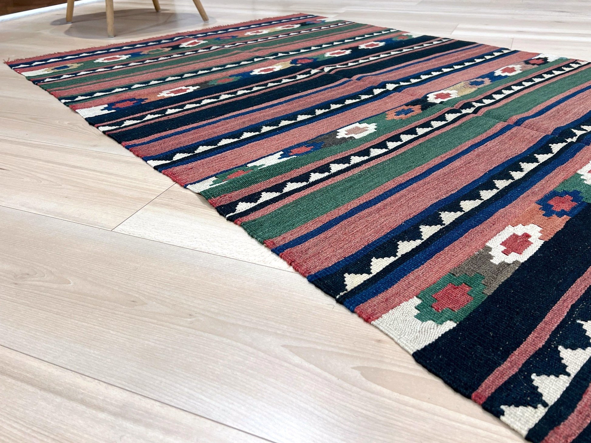 Vintage Caucasian Kilim flatweave rug with rose, green, and navy horizontal stripes and tribal motifs — handmade wool wall hanging from the 1960s, available at Indigo Rugs, the best rug shop in San Francisco Bay Area, Burlingame CA.
