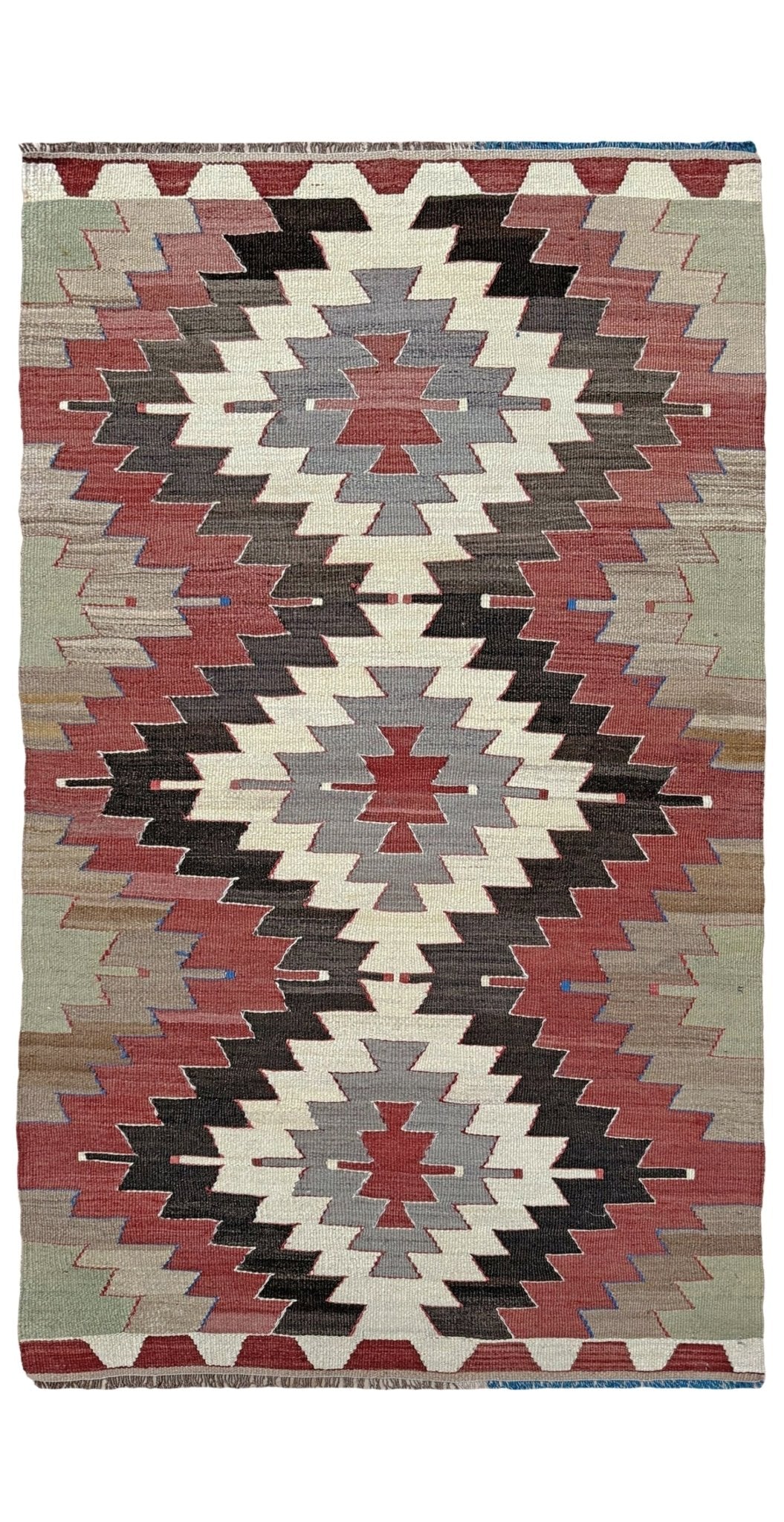 3x5 Vintage Mut kilim rug with Navajo-style stepped medallion design in clay red and charcoal — handwoven wool flatweave from 1970s Turkey, available at Indigo Rugs, Burlingame CA. Handmade rug with earth color for living room, bedroom, kitchen, study.