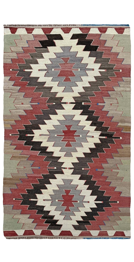 3x5 Vintage Mut kilim rug with Navajo-style stepped medallion design in clay red and charcoal — handwoven wool flatweave from 1970s Turkey, available at Indigo Rugs, Burlingame CA. Handmade rug with earth color for living room, bedroom, kitchen, study.