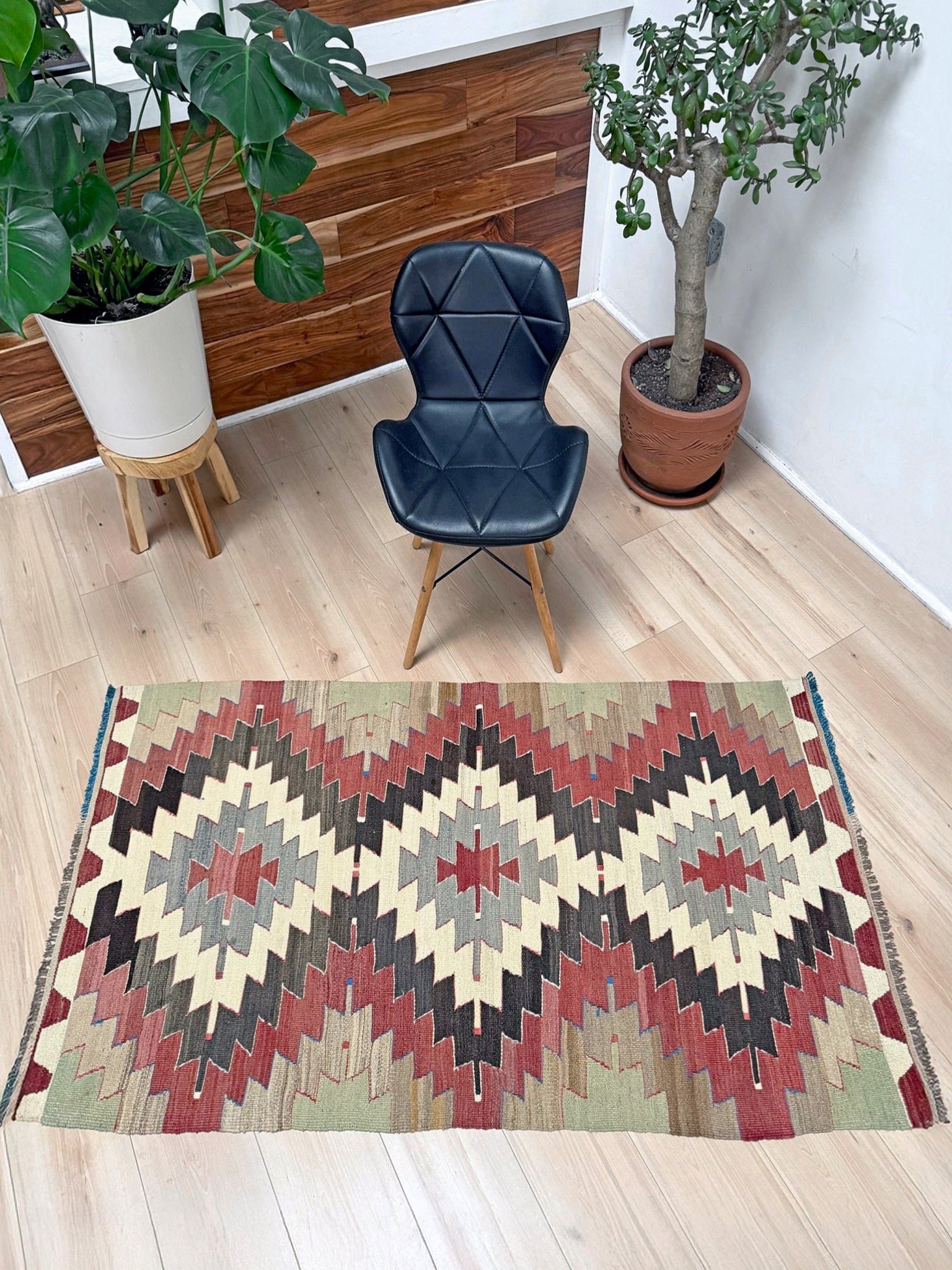 3x5 Vintage Mut kilim rug with Navajo-style stepped medallion design in clay red and charcoal — handwoven wool flatweave from 1970s Turkey, available at Indigo Rugs, Burlingame CA. Handmade rug with earth color for living room, bedroom, kitchen, study.