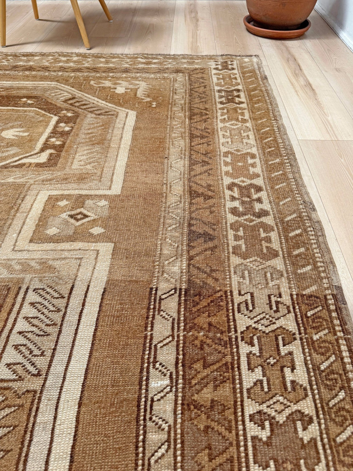 7x9 Muted brown vintage Kars Kurdish rug with three geometric medallions, stepped tribal motifs, ivory borders and naturally worn wool pile, handmade in Eastern Turkey,