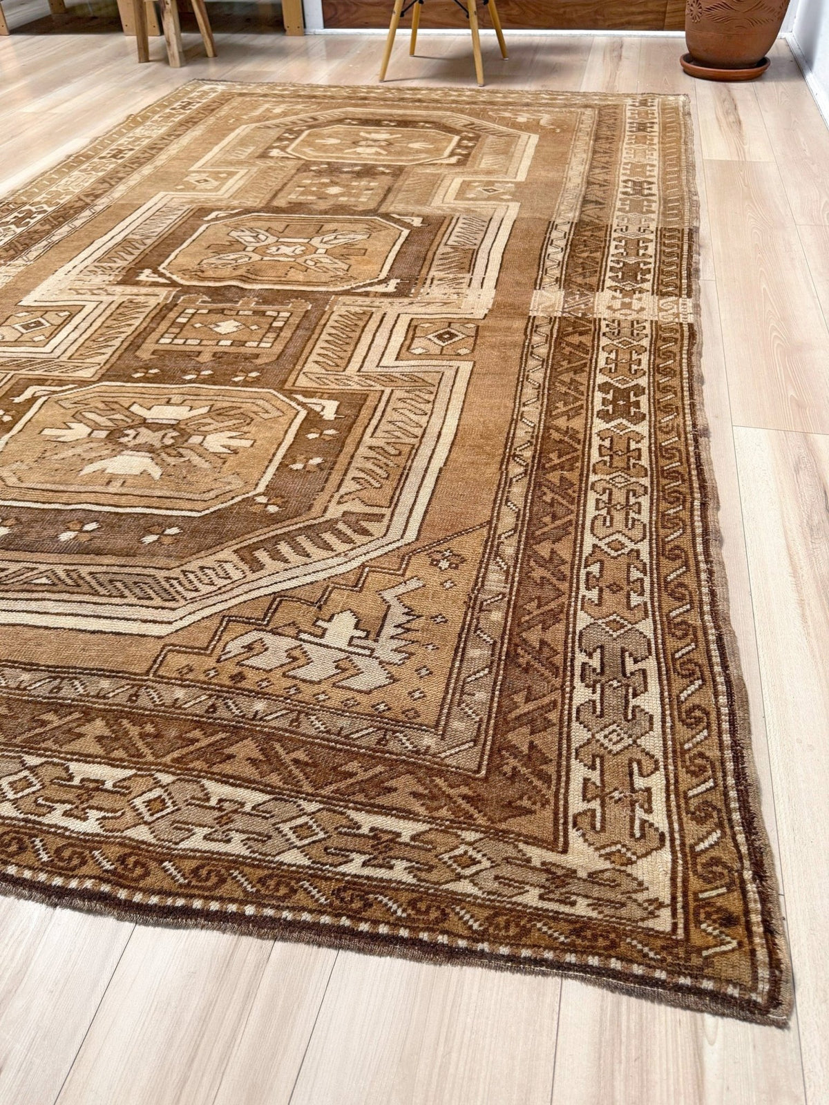 7x9 Muted brown vintage Kars Kurdish rug with three geometric medallions, stepped tribal motifs, ivory borders and naturally worn wool pile, handmade in Eastern Turkey,