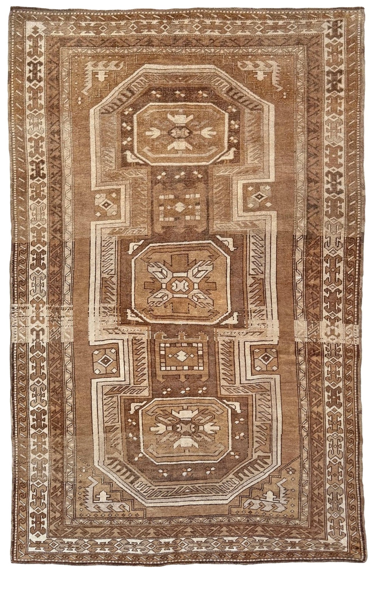 7x9 Muted brown vintage Kars Kurdish rug with three geometric medallions, stepped tribal motifs, ivory borders and naturally worn wool pile, handmade in Eastern Turkey,