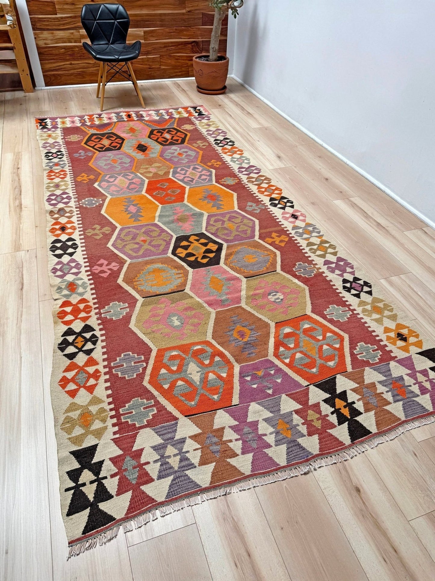 Handmade vintage Turkish kilim rug from 1960s, 5x12 runner with tribal motifs and vibrant colors like terracotta, magenta, ochre, and violet; perfect for entry, hallway, living room, bedroom, kitchen, or dining. Best for boho or modern decor. From the best rug shop San Mateo SF Bay Area with free shipping.