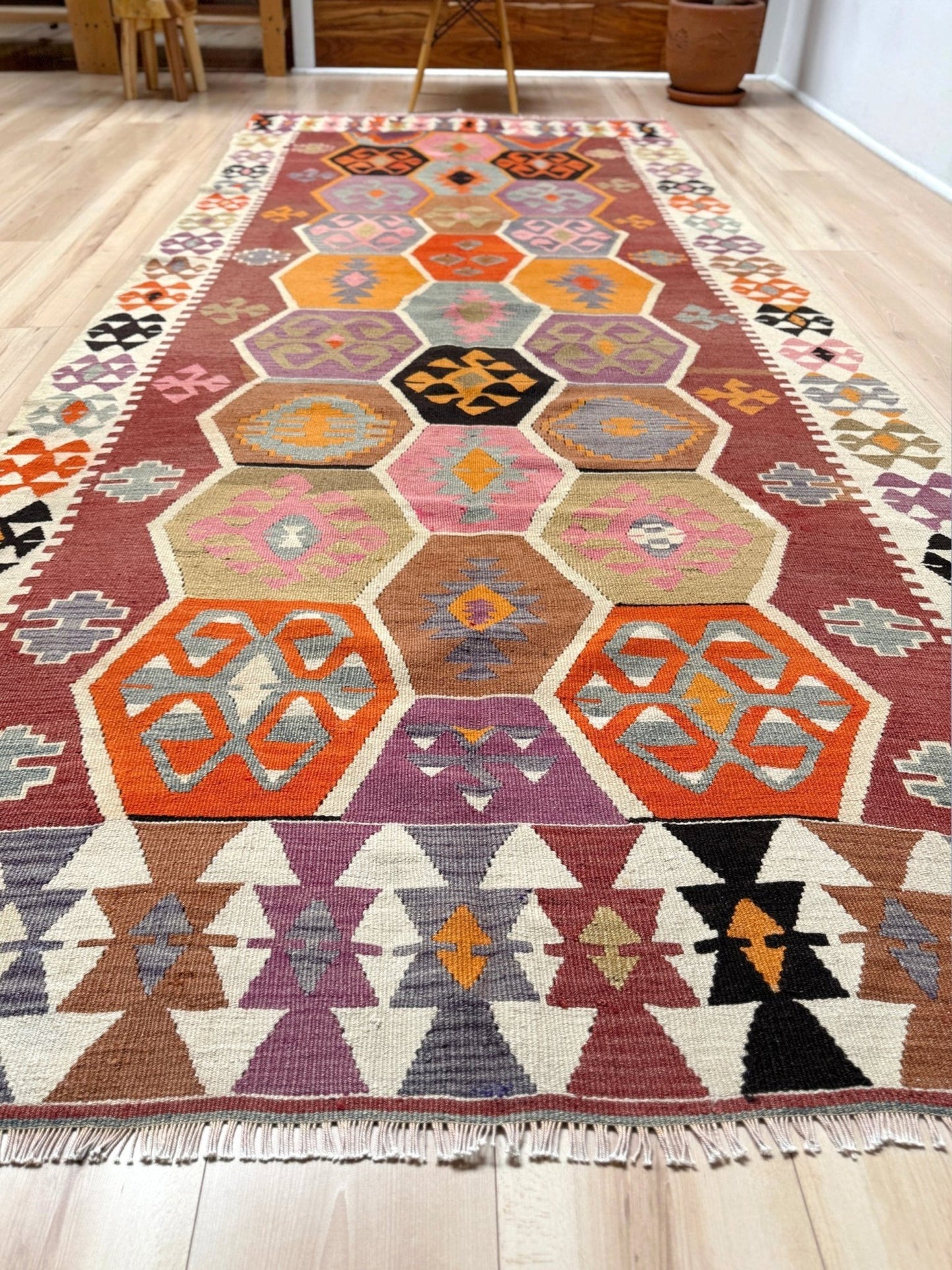 Handmade vintage Turkish kilim rug from 1960s, 5x12 runner with tribal motifs and vibrant colors like terracotta, magenta, ochre, and violet; perfect for entry, hallway, living room, bedroom, kitchen, or dining. Best for boho or modern decor. From the best rug shop San Mateo SF Bay Area with free shipping.