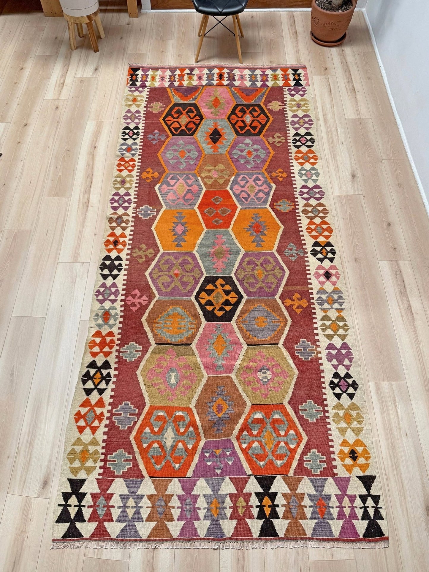 Handmade vintage Turkish kilim rug from 1960s, 5x12 runner with tribal motifs and vibrant colors like terracotta, magenta, ochre, and violet; perfect for entry, hallway, living room, bedroom, kitchen, or dining. Best for boho or modern decor. From the best rug shop San Mateo SF Bay Area with free shipping.